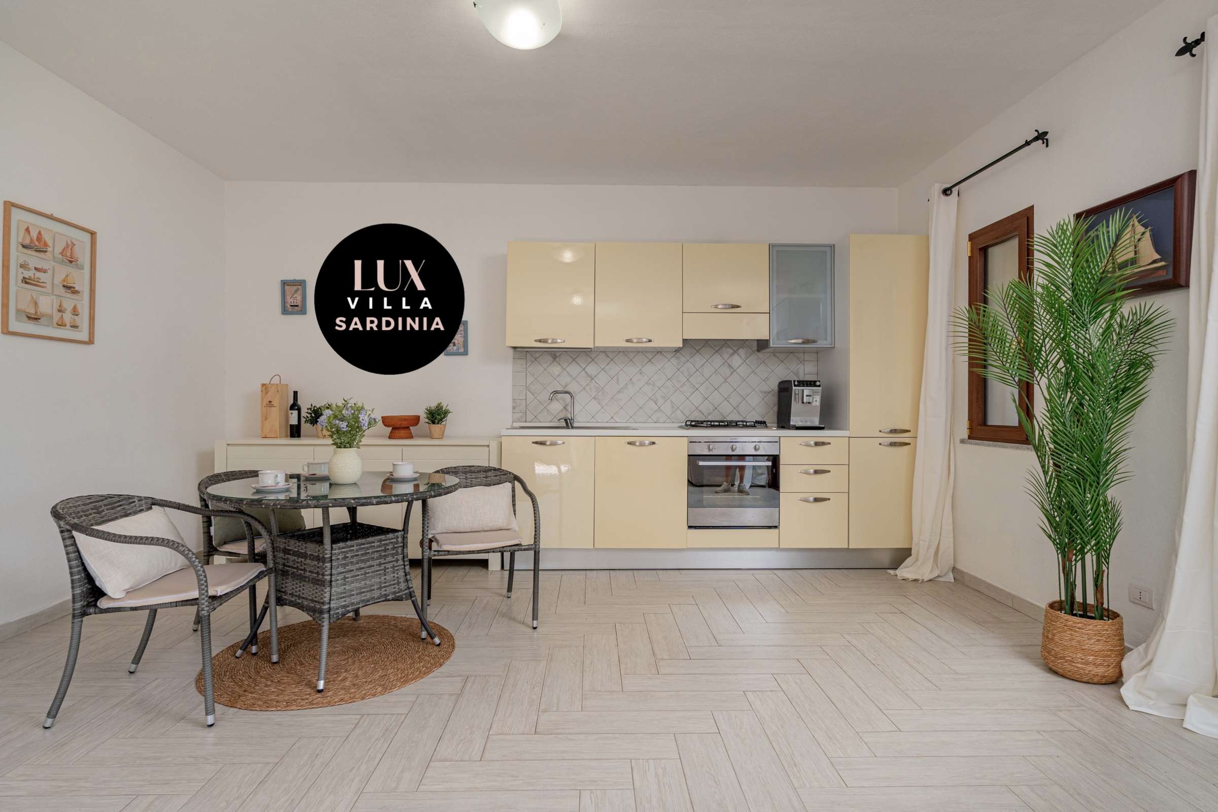 24 of 66. Modern kitchen with a cozy dining area, featuring sleek cabinetry and natural light. Perfect for entertaining.