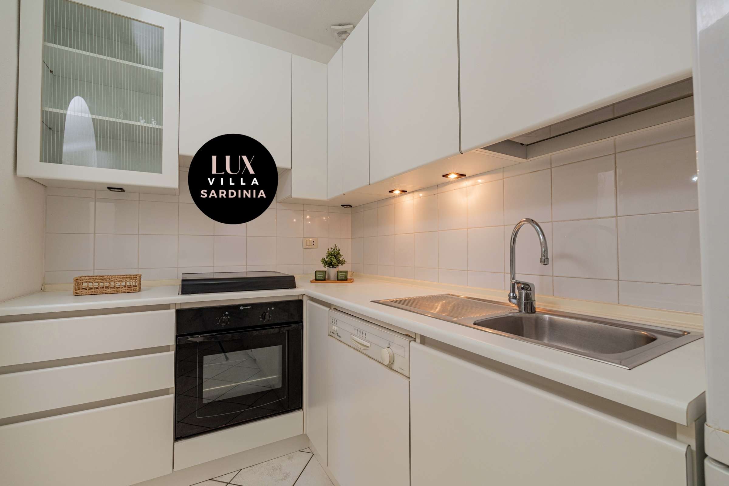 36 of 66. Modern kitchen featuring sleek cabinetry, ample counter space, and integrated appliances for efficient cooking.