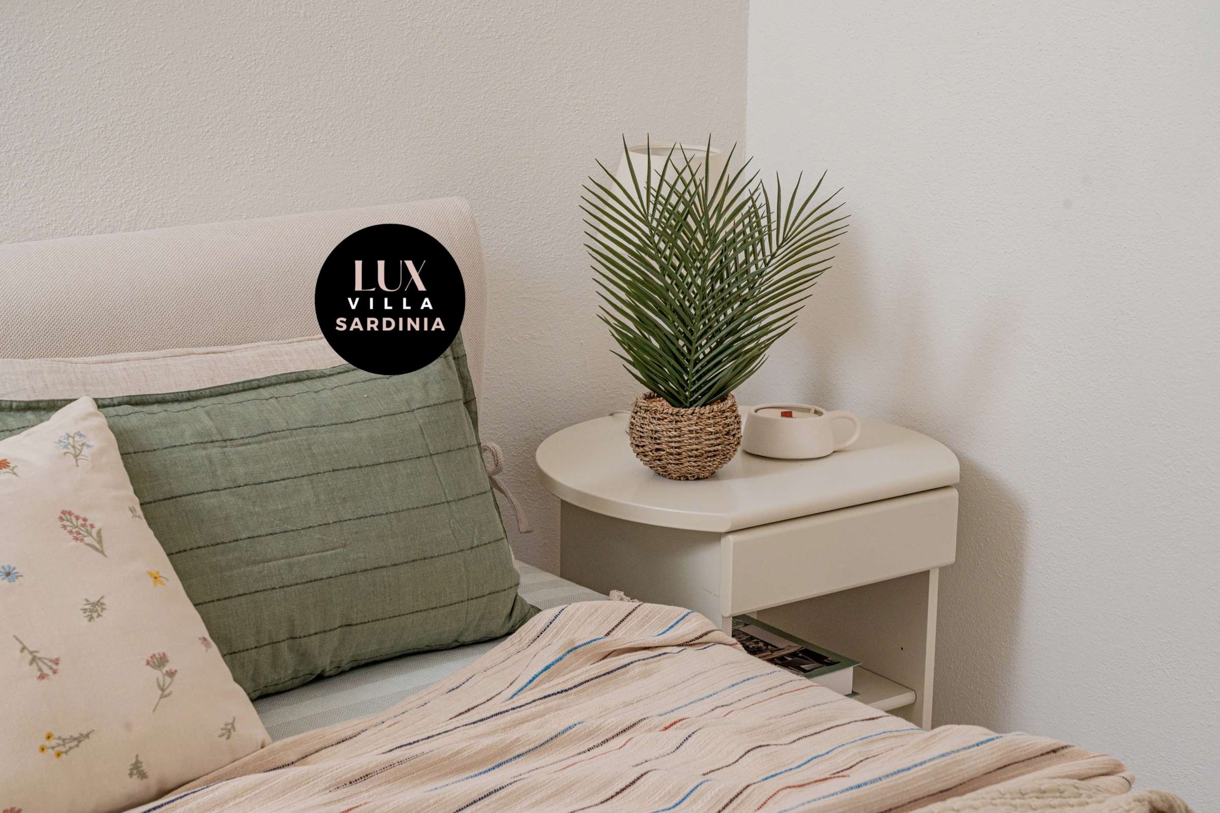 58 of 66. Cozy bedroom featuring natural textures, a minimalist design, and a refreshing indoor plant for added warmth.