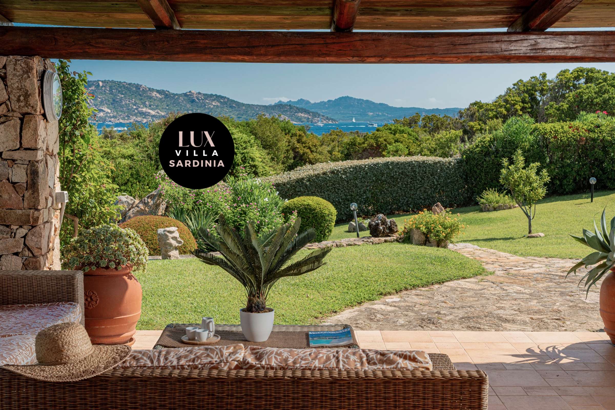 16 of 66. Experience breathtaking coastal views from this inviting outdoor living space surrounded by lush greenery.