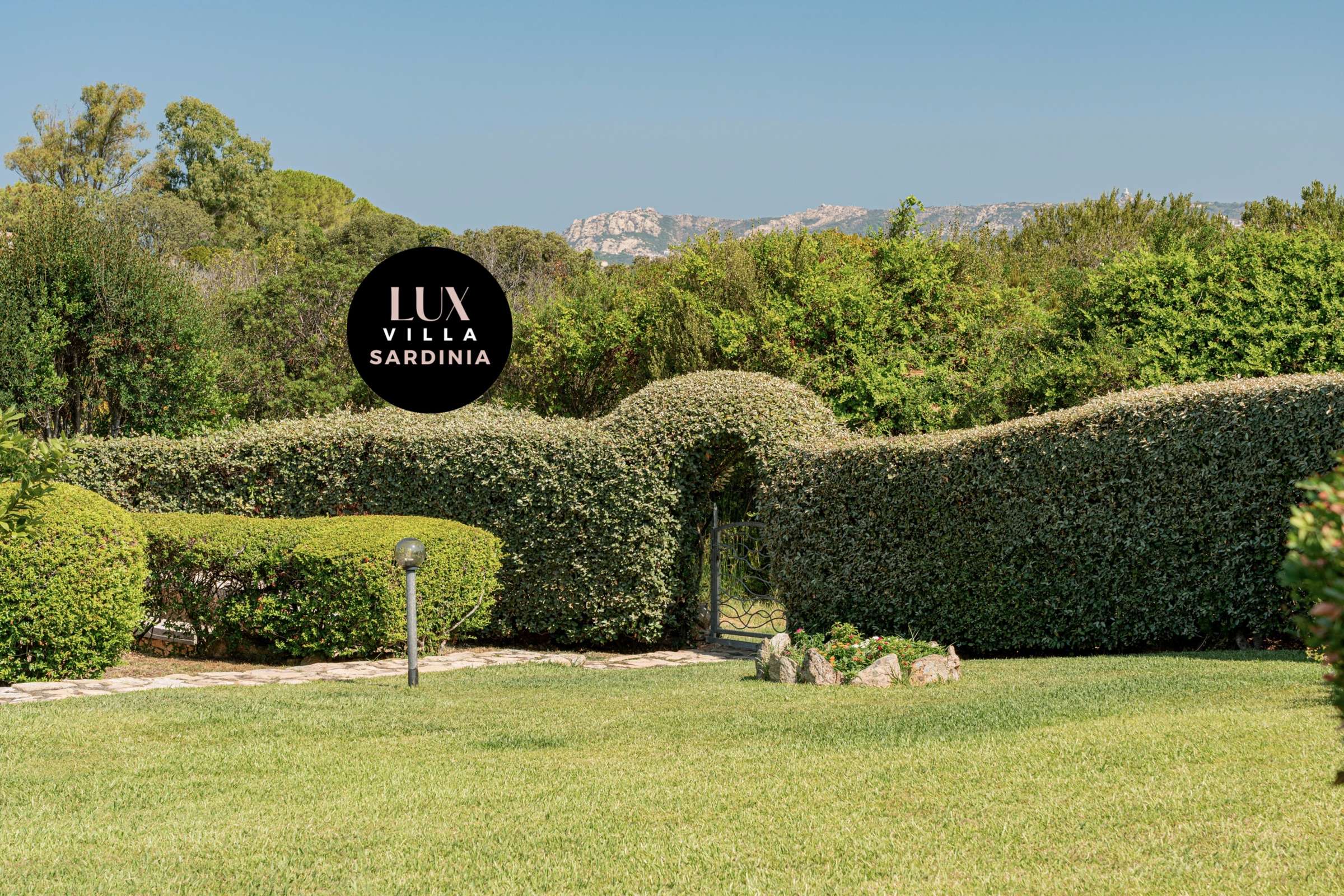 9 of 66. Discover a tranquil villa surrounded by lush greenery and stunning natural landscapes, perfect for relaxation.