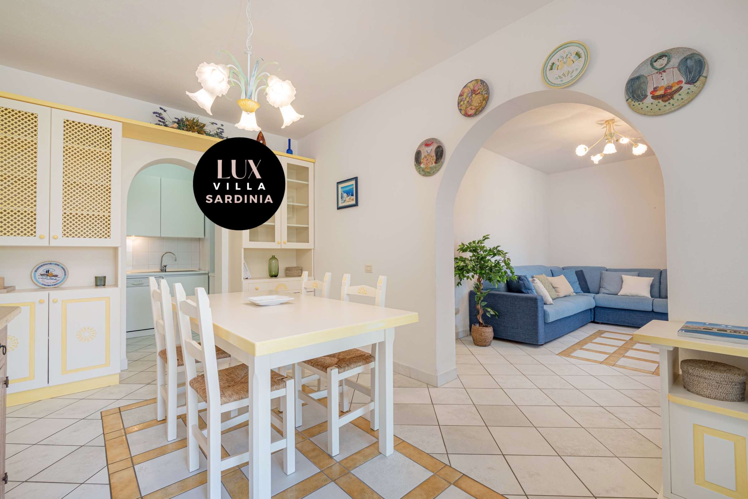 33 of 66. Bright and airy living space with a cozy dining area and modern kitchen, perfect for gatherings.