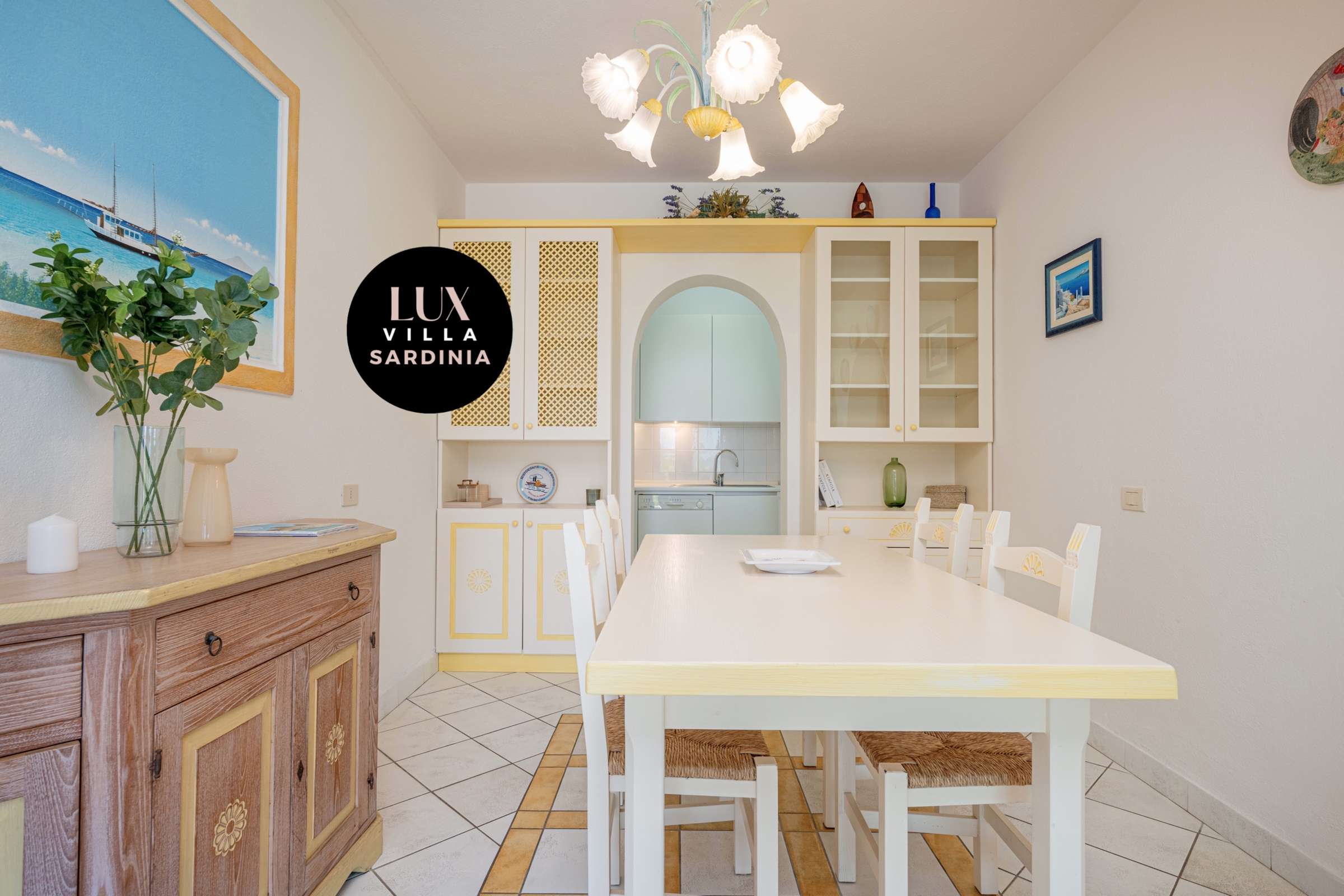 34 of 66. Bright and inviting dining area featuring ample natural light and a cozy kitchen space, perfect for gatherings.