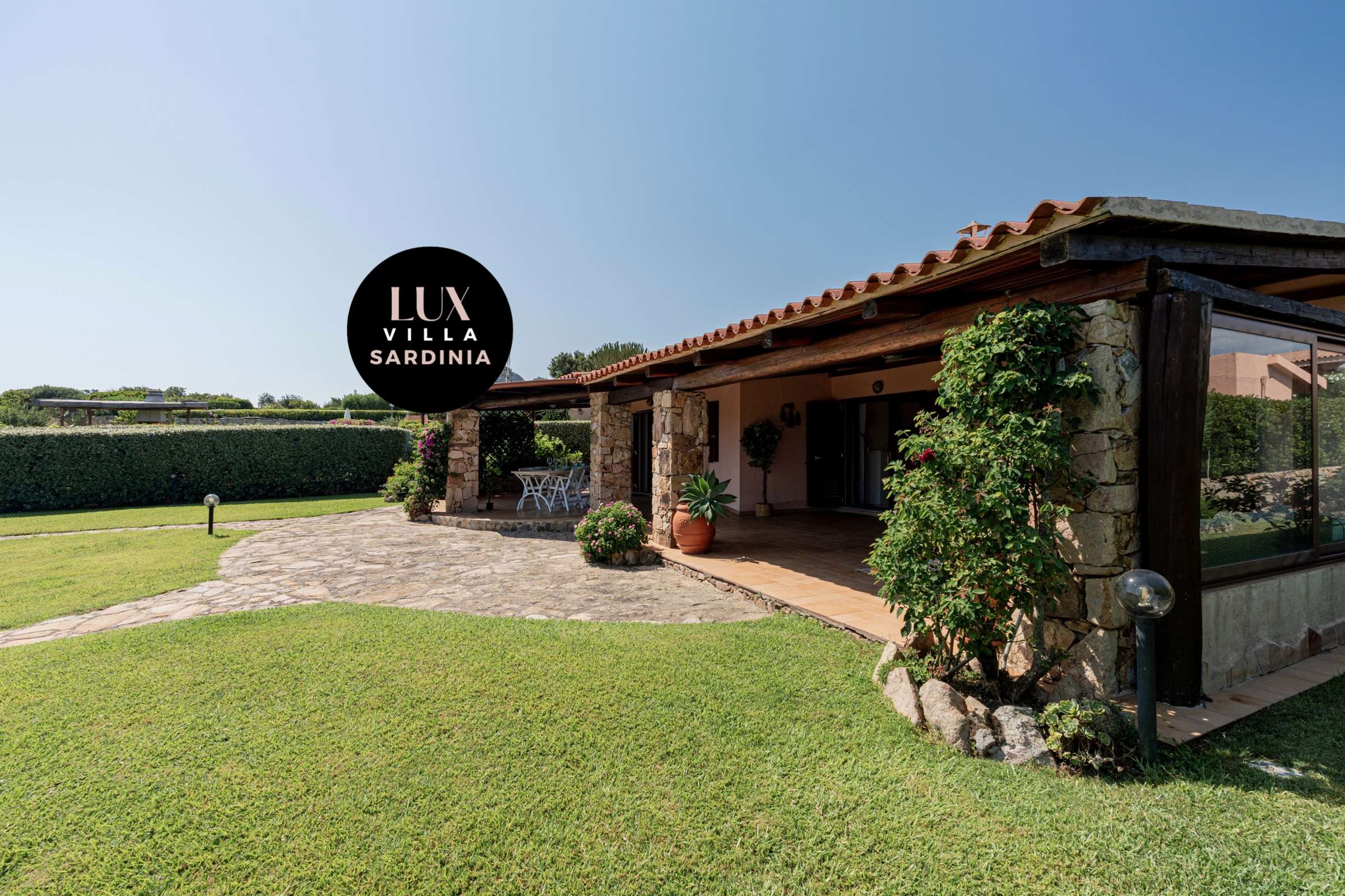 12 of 66. Discover this unique villa in Sardinia, featuring expansive outdoor spaces and stunning natural surroundings.