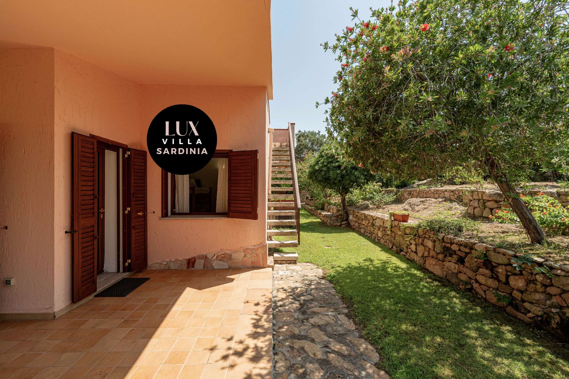 49 of 66. Discover this inviting villa with lush gardens and unique outdoor spaces, perfect for relaxation and gatherings.