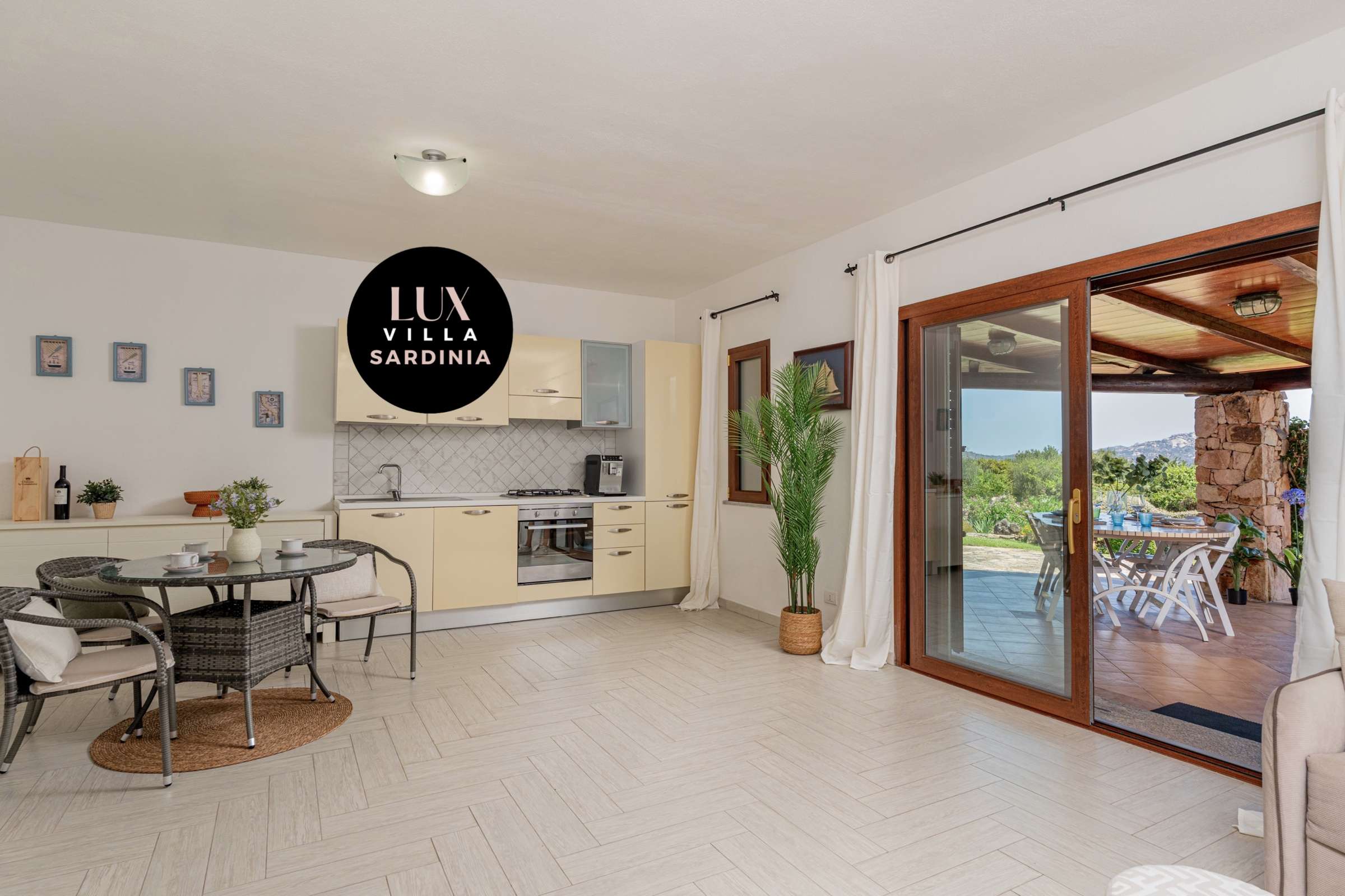 22 of 66. Bright and open kitchen seamlessly connects to a spacious living area, perfect for entertaining and relaxation.