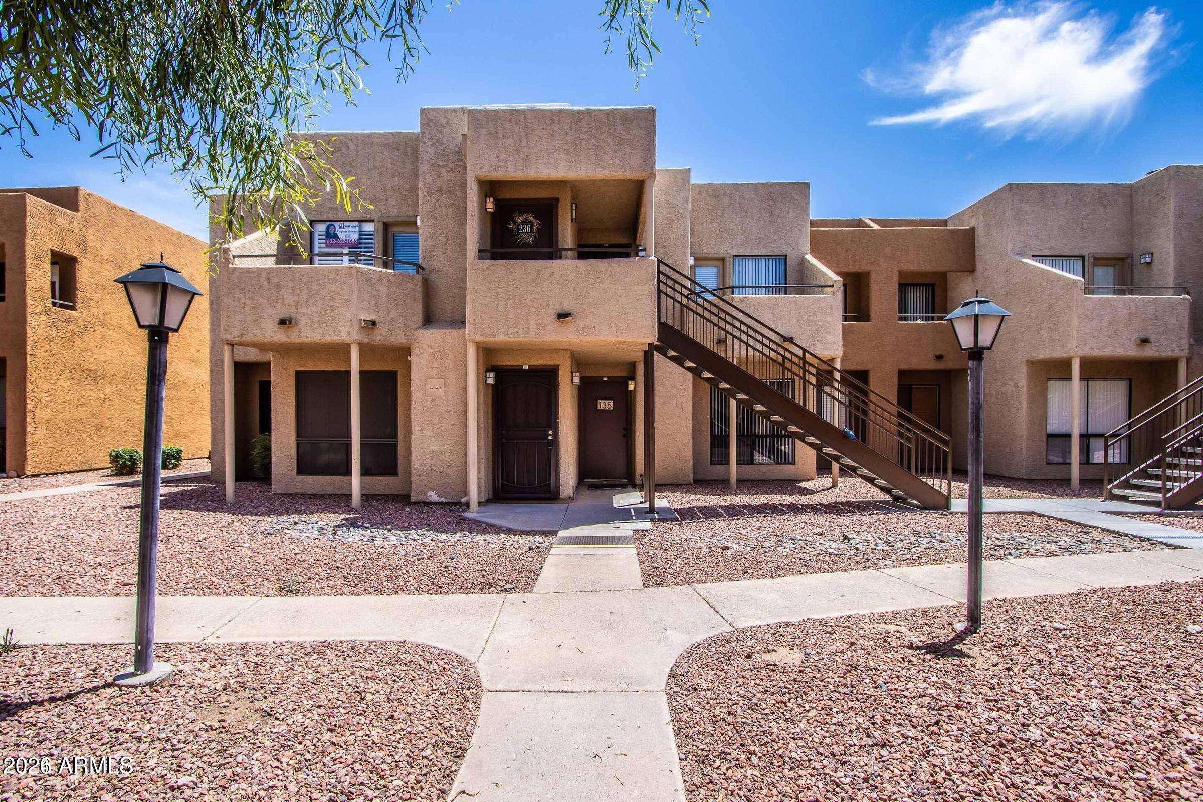 1 of 29. Charming Glendale condo exterior with attractive architecture, private access, and low-maintenance desert landscaping. A welcoming first impression in a desirable community setting.