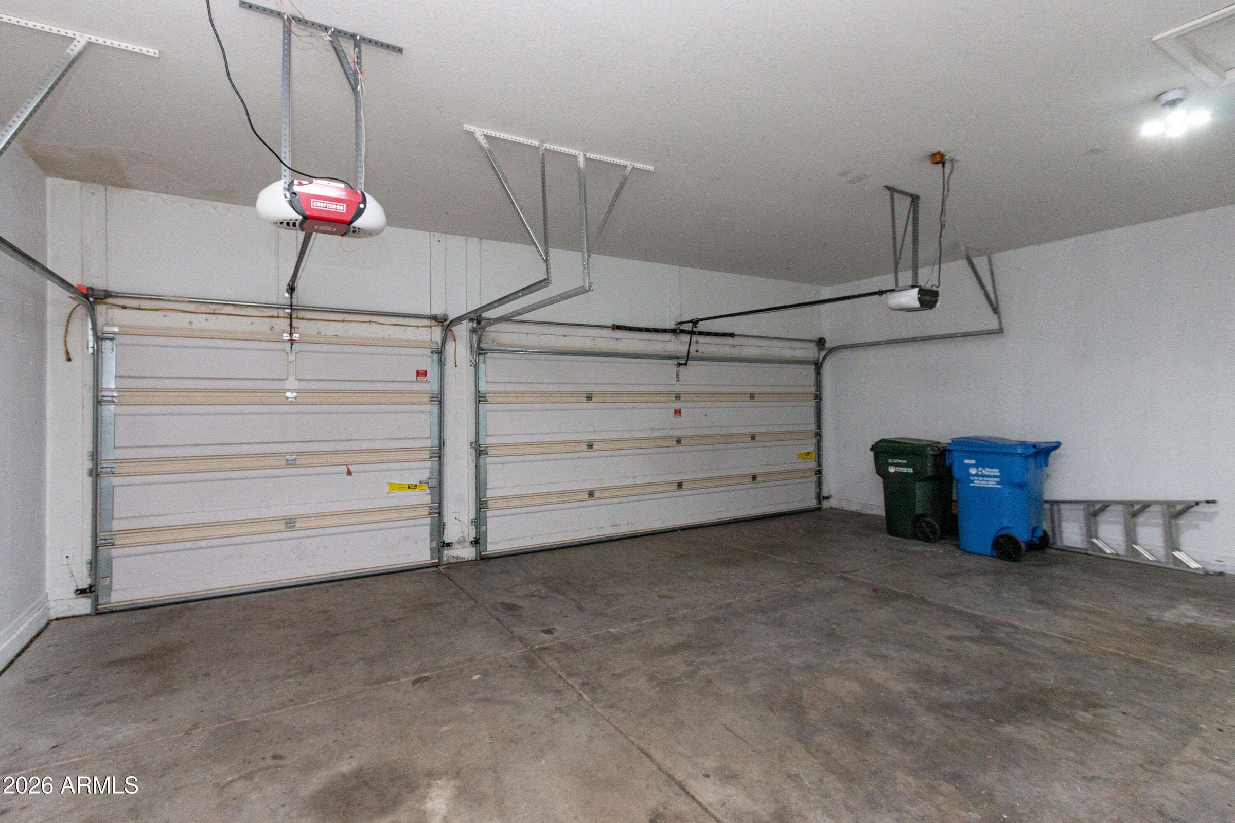 25 of 29. Large three-car garage with abundant storage potential and space for vehicles, tools, and outdoor equipment. A sought-after feature that enhances everyday functionality.