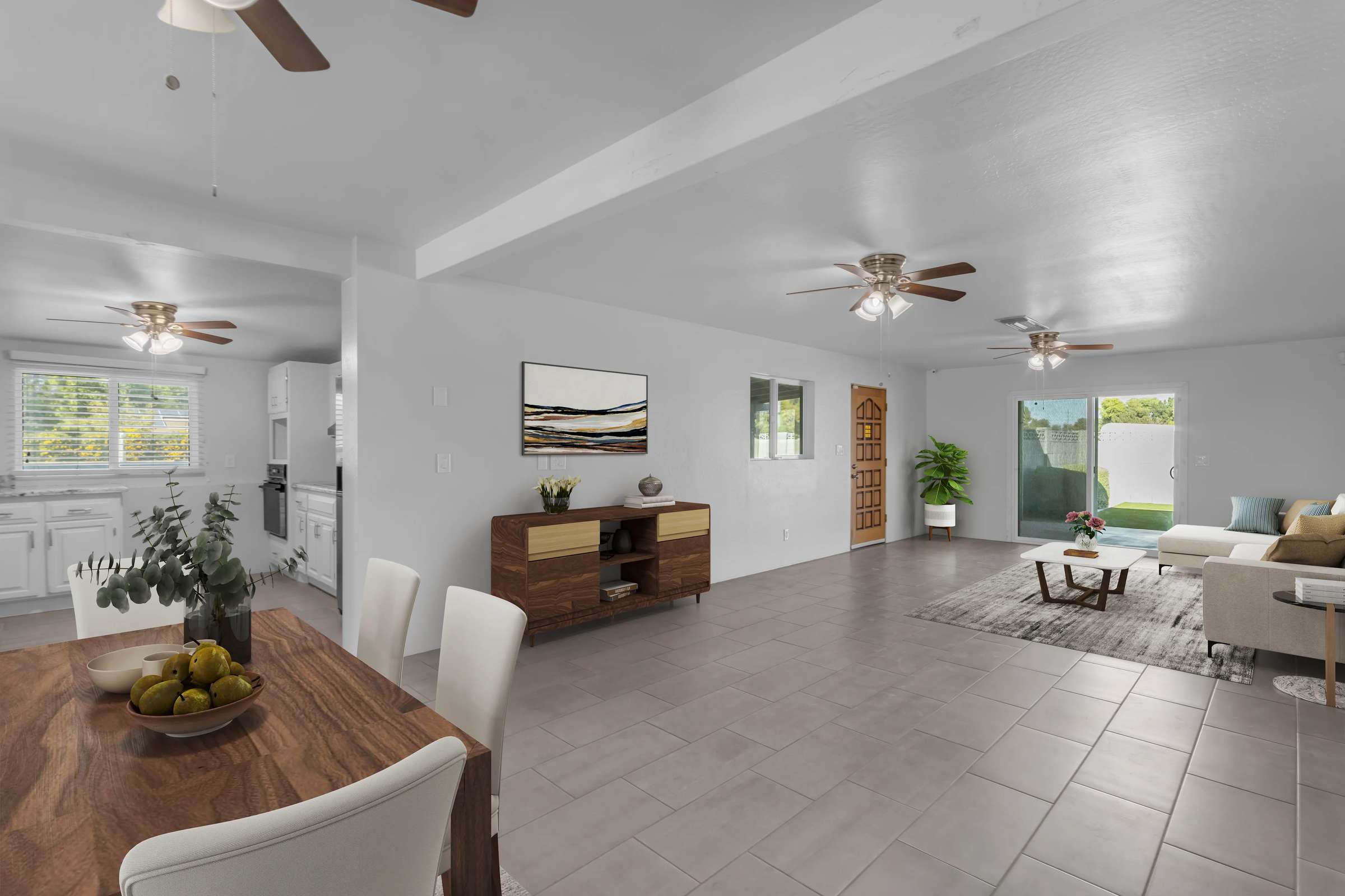 4 of 43. The virtually staged great room showcases an open floor plan with spacious living and dining areas, neutral finishes, tile flooring, and natural light that creates an inviting atmosphere for family and guests.