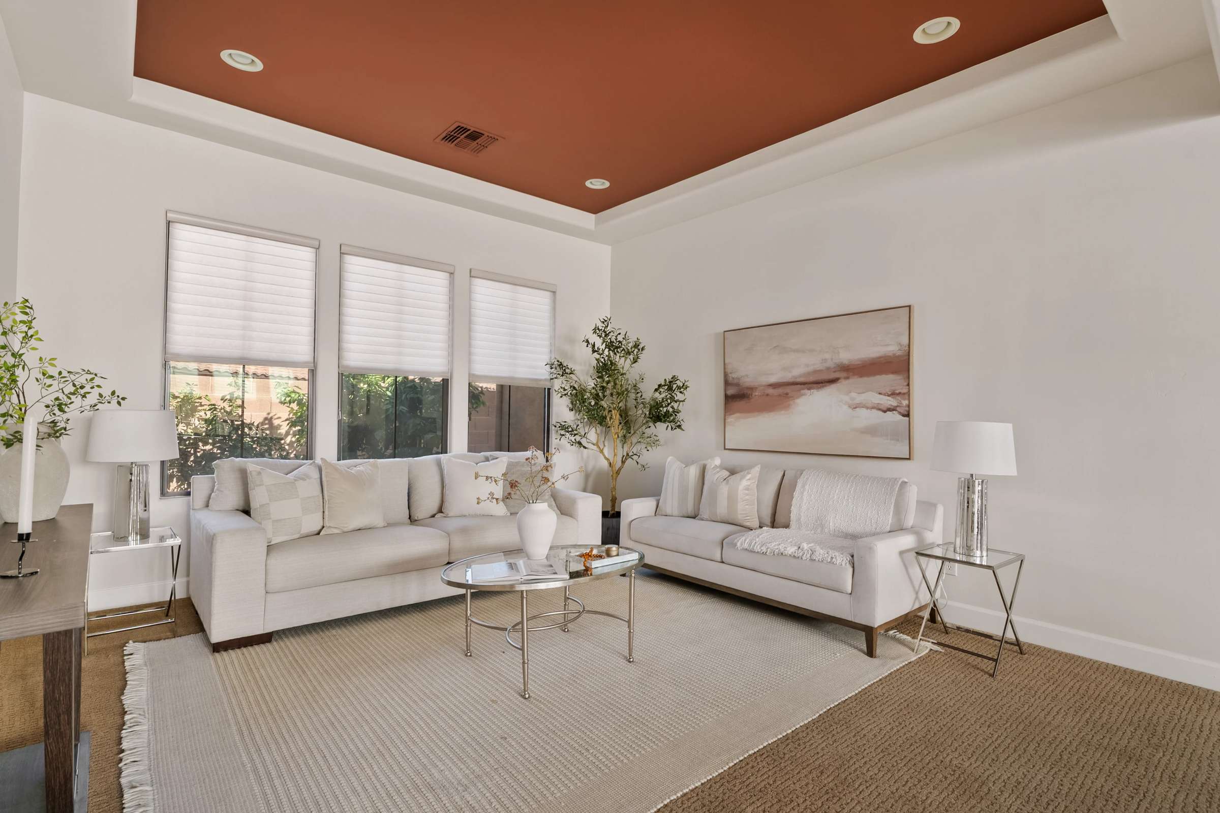 6 of 72. A welcoming formal sitting room offers elegant finishes, oversized windows, and versatile living space that provides comfort while enhancing the home's sophisticated floor plan.