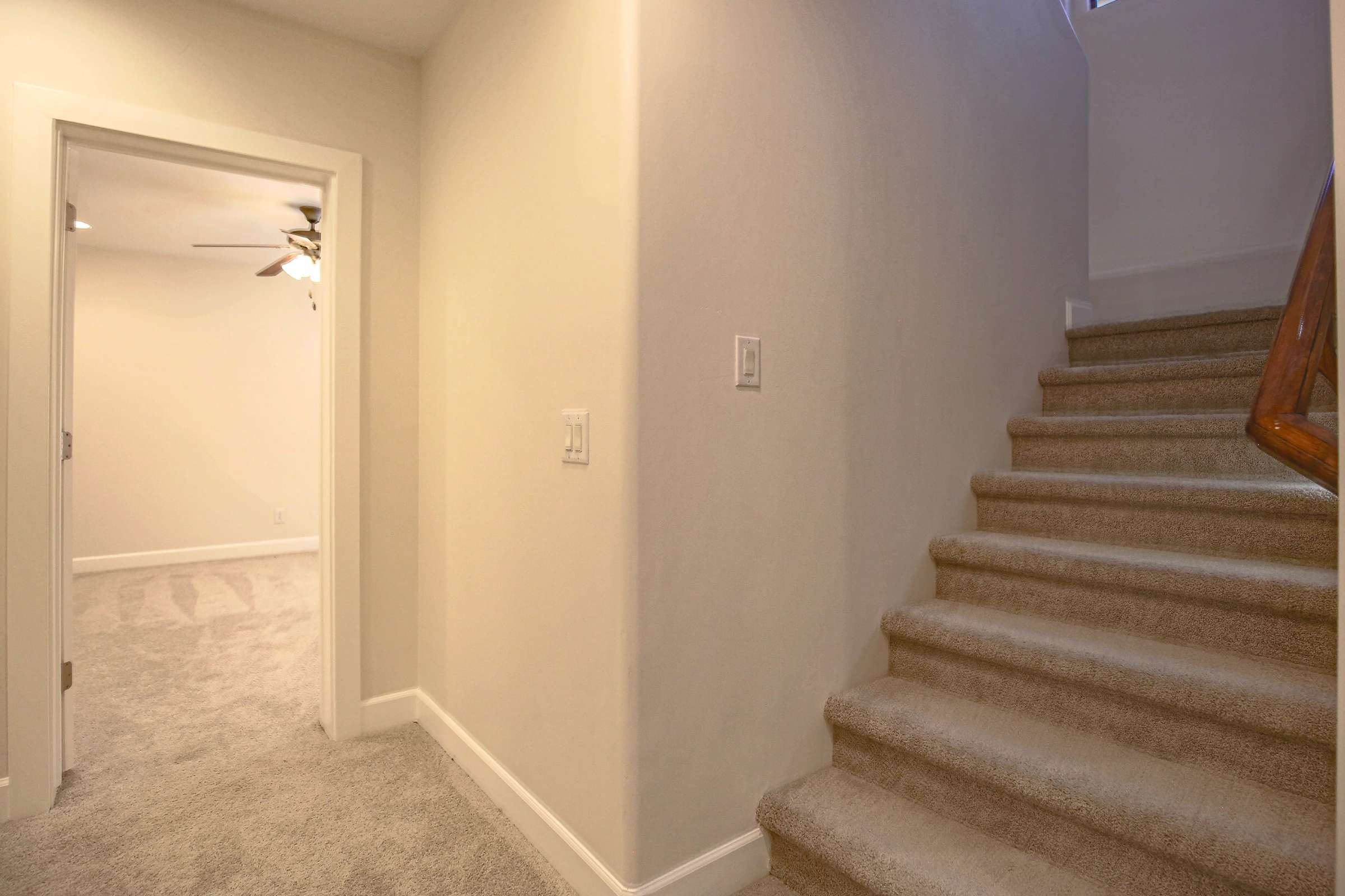43 of 72. This staircase provides seamless access to the finished basement, expanding the home's living space with room for recreation, entertaining, and flexible lifestyle needs.