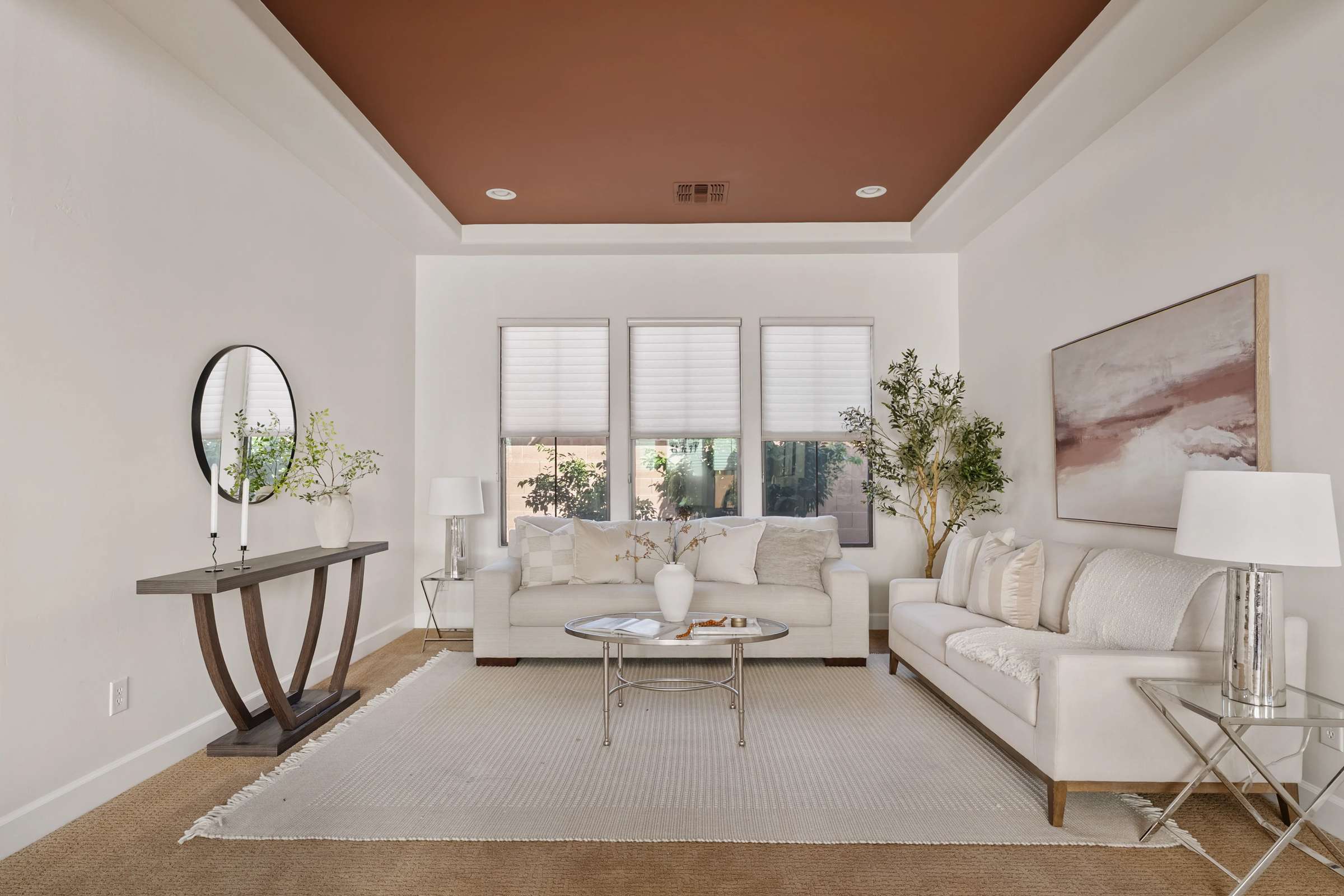 18 of 72. Featuring a tray ceiling, large windows, plush carpeting, and stylish finishes, this formal living room offers flexible space for entertaining, conversation, or quiet relaxation.