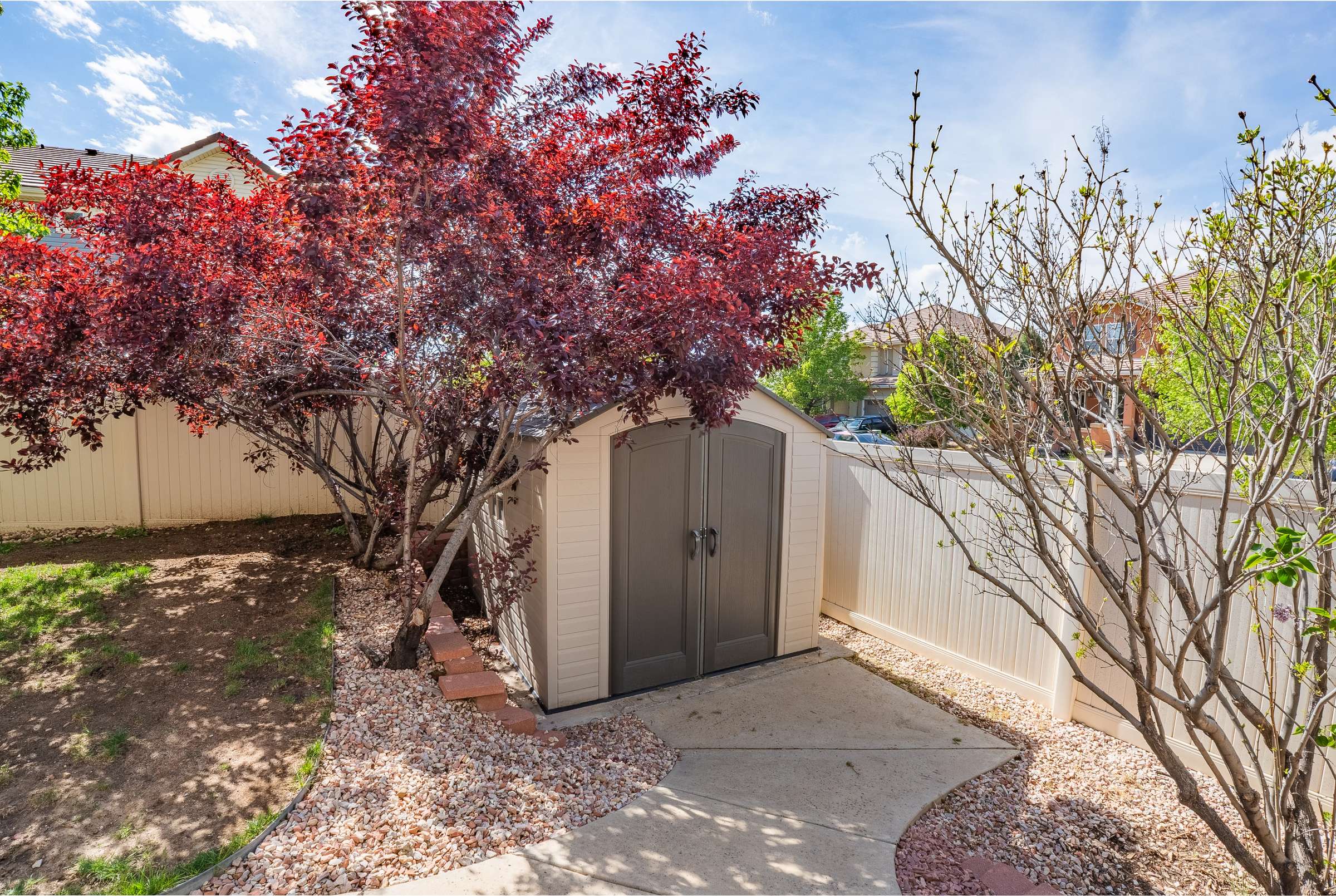 43 of 51. An included storage shed provides additional storage space for outdoor needs.