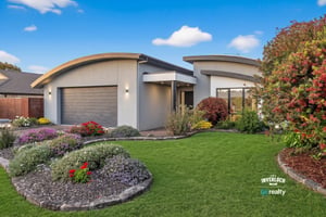 Sun-Filled, Single-Level Coastal Living With Solar, Powerwall and Gardens Already Grown