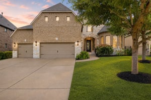 Stunning Rocky Creek Home with New Light Oak Floors, Media Room, Study & One of the Community's Best Flat Backyards