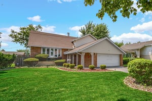 Rarely Available Modern Brick Quad-Level in Prime Oak Lawn Location