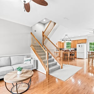 Bright and inviting open-concept living space featuring modern finishes and a seamless flow to the kitchen.