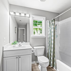 Bright bathroom with modern fixtures, natural light, and a clean, functional design for everyday comfort.
