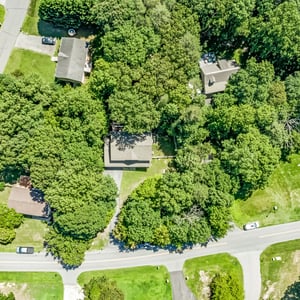 Discover a spacious home nestled in lush greenery, offering privacy and easy access to nearby amenities.