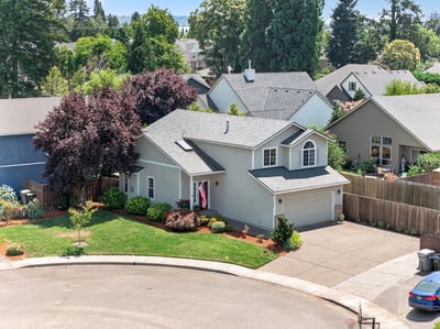 Well-maintained home on a quiet cul-de-sac, featuring a spacious yard and mature landscaping.