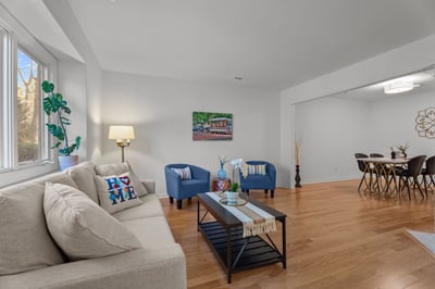 Living room with large window and new hardwood floors