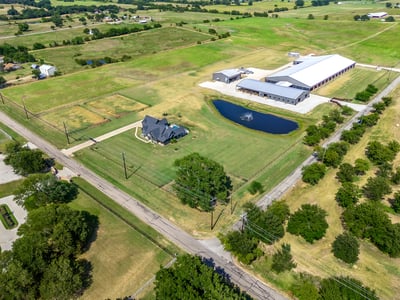 PROPERTY AERIAL...Beautiful Custom Home On 55+ Acres With Incredible Horse Facilities In Great Location And Road Frontage On 2 Sides!
