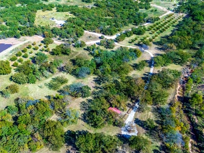 PROPERTY AERIAL...The View Of Red Roof Located Towards Bottom Of Photo Is The Log Cabin