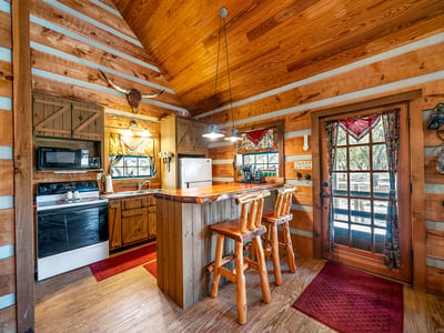 KITCHEN...Wood Floor, Wood C-Tops, Breakfast Bar