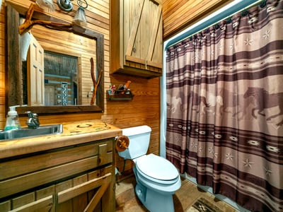 BATHROOM...Single Vanity, Tub/Shower Combo, Located On First Floor