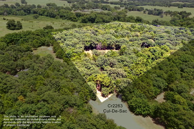 PROPERTY AERIAL...Beautiful Heavily Wooded 5+ Acre Lot With A Cleared Homesite And A Creek Along The Back. Property Outlines Are Approximate