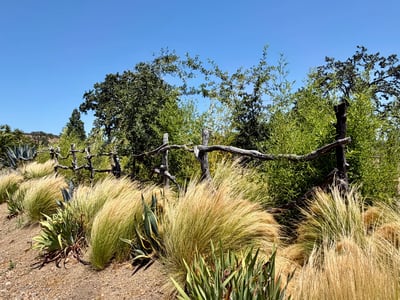 DECORATIVE WOOD FENCE IN FRONT.