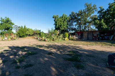 BACK YARD, FLAT USABLE AREA TO DEVELOP GARDEN OR WHAT EVER YOUR NEEDS ARE.