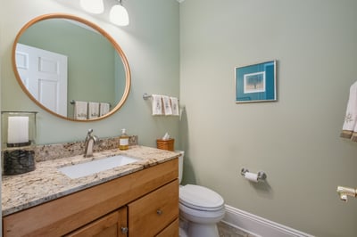 First floor powder room by garage entrance