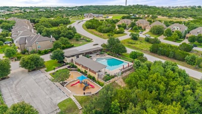 Walk to the neighborhood pools, park and miles of trails