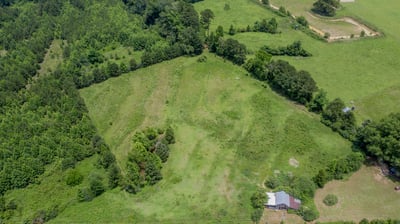 Expansive land offering endless possibilities, nestled in a picturesque rural landscape.