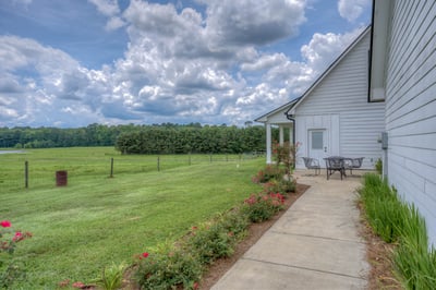 Discover a peaceful retreat with expansive green views and ample outdoor space perfect for relaxation.