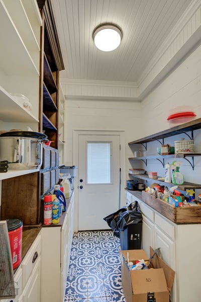 Spacious utility room with ample storage, perfect for organization and functionality in your home.