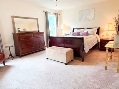 Primary Bedroom w/ Neutral Carpeting