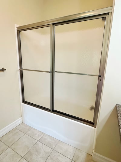 Fiberglass tub/shower & ceramic tile floor