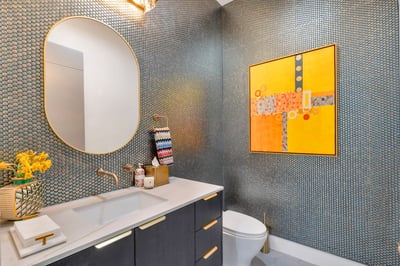 Chic powder room featuring bold textures, contemporary fixtures, and designer finishes. This Paradise Valley home highlights attention to detail and modern luxury.