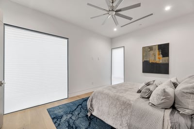 Light-filled bedroom with contemporary finishes and comfortable layout. This Paradise Valley home provides versatile space for guests or family.