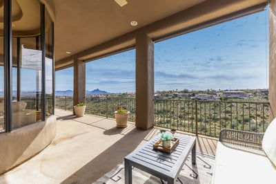 Enjoy expansive desert and mountain views from this covered outdoor living space. The spacious patio provides a private setting for morning coffee, evening gatherings, and year-round enjoyment in Fountain Hills.