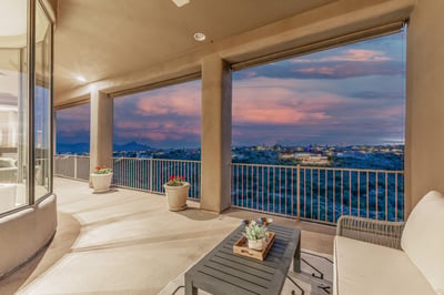 Beautifully positioned covered patio offering colorful sunset skies and expansive valley views. This Fountain Hills outdoor space creates the perfect atmosphere for relaxing evenings and entertaining guests.