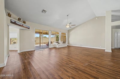 Enjoy flexible living and entertaining space with backyard views, vaulted ceilings, and abundant natural light. Neutral finishes and spacious dimensions allow buyers to easily envision their personal style.