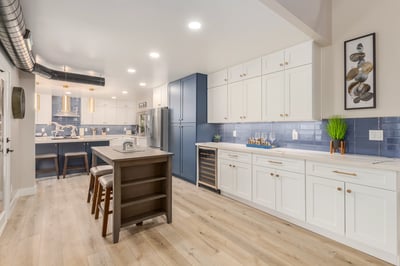 Beautifully remodeled kitchen offering abundant cabinetry, wine storage, quartz counters, and designer finishes. A highly functional Scottsdale kitchen built for modern living.