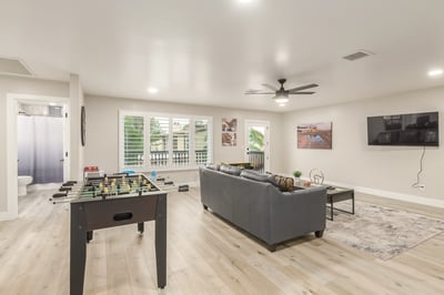 Large upstairs loft with dedicated game space, media viewing area, natural light, and balcony access. Perfect for entertaining or everyday relaxation in Scottsdale.