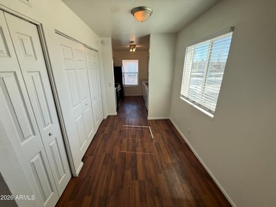 Bright dining space accented by large windows and attractive flooring. Conveniently positioned between the living area and kitchen, it creates an ideal flow for daily living and entertaining.