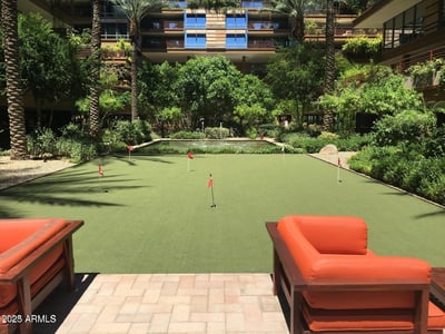 Community putting green surrounded by mature landscaping and tranquil outdoor spaces. Residents enjoy access to premium recreational amenities that support an active and social lifestyle.