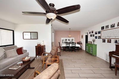 Offering flexibility for a variety of furniture arrangements, this spacious living area is ideal for gathering with family and friends. Bright interiors and easy-care tile flooring add lasting appeal.