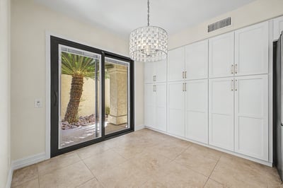 Casual dining space featuring custom storage cabinetry, designer lighting, and courtyard views. A bright and inviting area that blends functionality with modern style.
File Name: 11 15 - Purdue.jpg